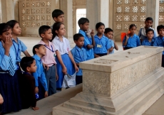 A group of school children in Nizamuddin Basti visit the Chaunsath Khamba, a 17th century tomb. They are guided by AKTC-trained heritage volunteers from the Sair-e-Nizamuddin group.