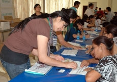 Members of the Jamat register for the Tanzania visit.