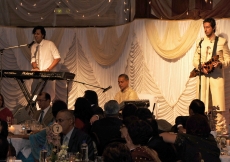 Musicians Salim and Suleman Merchant performed two songs at the institutional dinner, dedicating their performance to Mawlana Hazar Imam.