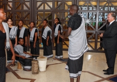 Mawlana Hazar Imam takes in a performance by members of the choir at the Aga Khan Academy, Mombasa.