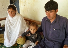 A healthy and smiling Dilshad Wali is seen with her husband and their 10-month old son Naeem.