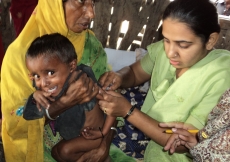 A child is treated at a mobile health clinic run by the Aga Khan Health Service, Pakistan in Sindh.