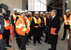 The contractor&amp;rsquo;s representative provides Mawlana Hazar Imam with an overview of construction progress at the Aga Khan Museum.