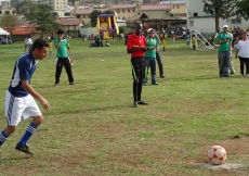 A football player prepares to take a penalty shot at the Ismaili Games Uganda.