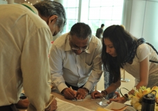 Volunteers prepare for registration ahead of Mawlana Hazar Imam&amp;rsquo;s visit with the Far East Jamat.
