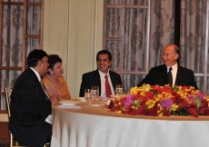 Mawlana Hazar Imam shares a light moment with President Inayat Bana, Vice-President Banoo Shanaz Mawji and Shafik Sachedina during the Far East Instititional Dinner.