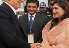 Mawlana Hazar Imam is welcomed to Bangladesh by President Banoo, as Ismaili Council President Rai Sulaiman Ajanee looks on.