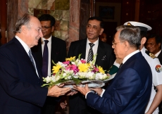 Mawlana Hazar Imam is presented with flowers by His Excellency Abdul Hamid, President of Bangladesh.