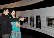 RAYS OF LIGHT visitors take in photographs spanning Mawlana Hazar Imam&amp;rsquo;s life and his work during the first fifty years of his Imamat.