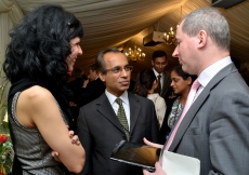 Stephen Williams MP, Parliamentary Under Secretary of State for Communities and Local Government in discussion with representatives of the Jamat.