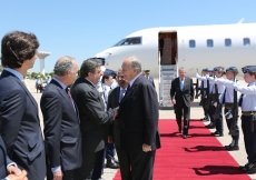 Mawlana Hazar Imam is greeted by Portuguese Secretary of State for Cooperation and Foreign Affairs, Dr Campos Ferreira, as Dr José Ludovice, Executive Officer of the Nort-South Centre of the Council of Europe looks on.