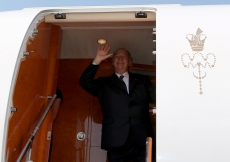 Mawlana Hazar Imam waves from the airplane before departing Portugal.