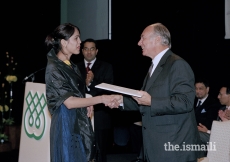 Mawlana Hazar Imam presenting certificates to the Class of 2004 of the Graduate Programme in Islamic Studies and Humanities - 25th Anniversary of the Institute of Ismaili Studies, London, 19 October 2003.