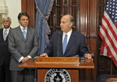 Mawlana Hazar Imam addressing the media prior to the signing of the Memorandum of Understanding between the University of Texas and the Aga Khan University, as Governor Rick Perry of Texas listens intently. 