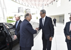 Upon arrving at the Ismaili Centre, Toronto, Mawlana Hazar Imam is greeted by Ismaili Council for Canada President Malik Talib and Vice-President Moez Rajwani. Gary Otte