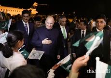 Mawlana Hazar Imam is received by Muhammad Zubair, Governor of Sindh and Syed Murad Ali Shah, Chief Minister of Sindh, and greeted by Junior Guides and Shaheen Scouts from the Sindh Jamat upon his arrival at Karachi airport