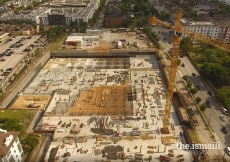 Site view looking south – mat slab foundation and lower level deck progress.