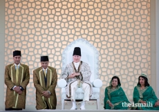 Mawlana Hazar Imam at the Diamond Jubilee Darbar in London, with Mukhi Saheb, Kamadia Saheb, Mukhiani Saheba, and Kamadiani Saheba of London Darkhana.