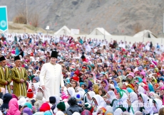 Mawlana Hazar Imam walks through the Jamat during the Darbar at Garamchashma, Lower Chitral 