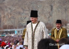 Mawlana Hazar Imam walks through the Jamat during the Darbar at Taus, Yasin