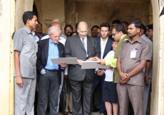 Mawlana Hazar Imam is joined by Prince Aly Muhammad and Iliyan as he reviews ongoing conservation work on the tomb of Mohammed Quli Qutb Shah. AKDN / Lipi Bharadwaj