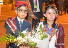 Young children prepare to present a bouquet of flowers to Mawlana Hazar Imam upon his arrival 