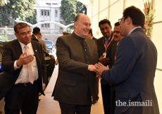 Mawlana Hazar Imam being received upon arrival at Darkhana Jamatkhana, Karachi