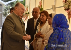 Mawlana Hazar Imam being received upon arrival at Darkhana Jamatkhana, Karachi