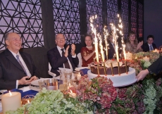 Members of Hazar Imam’s family applaud as the birthday cake is presented to Mawlana Hazar Imam. Photo: Zahur Ramji