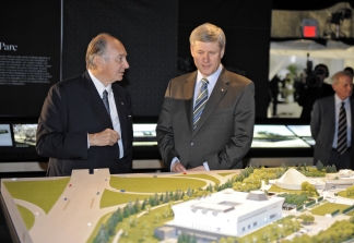 Mawlana Hazar Imam and Prime Minister Stephen Harper in the Exhibition Tent, examining the architectural model.