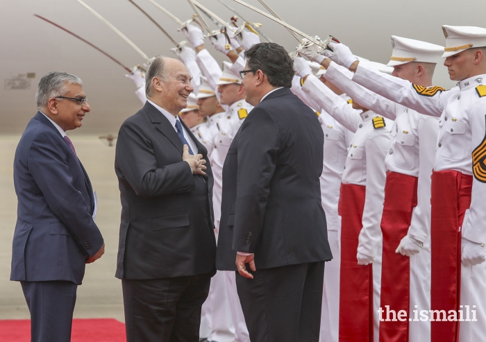 Mawlana Hazar Imam is greeted upon his arrival in Houston by Texas Secretary of State Rolando Pablos as Dr. Barkat Fazal, President of the Ismaili Council for USA, looks on.