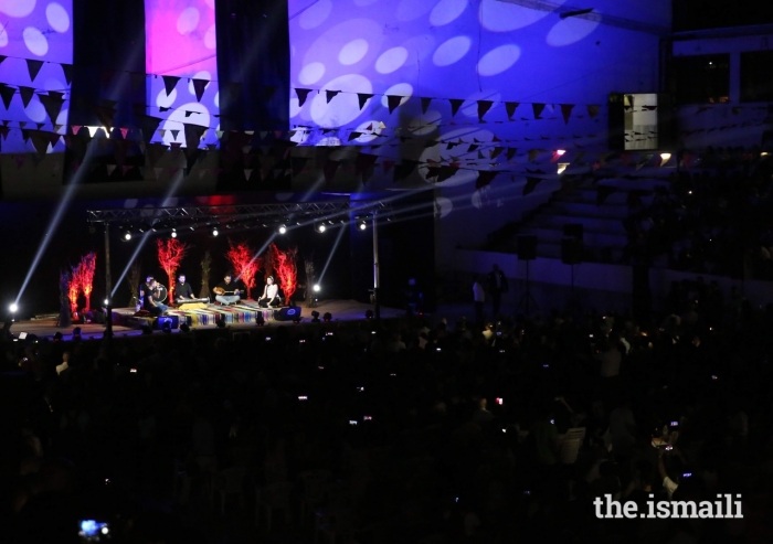 The audience enjoys a performance by Takkaat — a well-known band composed of five Ismaili artists who met through Jubilee Arts, and were part of the Syrian contingent at the International Arts Festival.