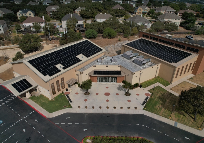 The Ismaili Muslim Community's commitment to renewable energy at the San Antonio Jamatkhana aligns with the Aga Khan Development Network's goal of achieving carbon neutrality by 2030.