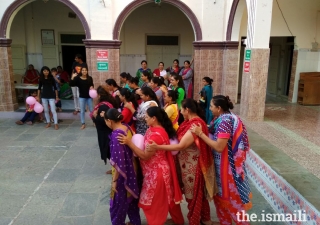 ‘Break For A Day’ participants enjoying themselves in a fun activity organised by young members of the Jamat. 