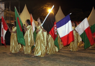 National Flags paraded during the Closing Ceremony of the inaugural Golden Jubilee Games. 