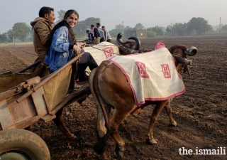 A day in the life of a farmer: GE Expedition participants join in an early morning excursion with Ismaili farmers.