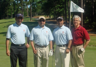 Participants pose at the Atlanta golf tournament, held at Country Club of the South. 