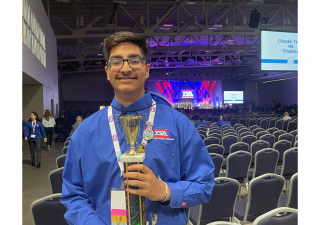 Amran Hudda with his National Leadership Bowl trophy