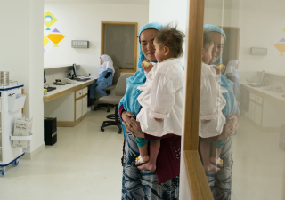 The Aga Khan Health Services (AKHS) began operating the Bamyan Hospital in 2004. Today it is a state-of-the-art 141-bed facility: over half of the building's power is supplied by solar panels located on a hilltop behind the hospital.