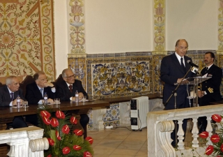 Mawlana Hazar Imam speaking at the International Symposium at the University of Evora, watched by (left to right): Rector of the University of Evora, Professor Manuel Patricio; President Sampaio; and Professor Adriano Moreira.