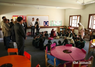 Prince Rahim and Princess Salwa with students and teachers at the Diamond Jubilee School in the village of Darkut, Silgan Valley, Ghizer District, in Gilgit-Baltistan. The school is operated by the Aga Khan Education Services (AKES).