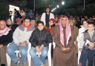 Dr Soroya Janmohamed with patients from Hama and Salamieh who travelled to the eye health camp.  