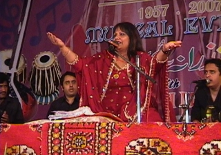 Shabnam Merali performs before a live audience. 