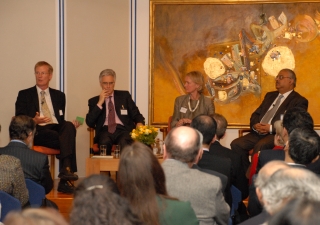 The panellists engage in discussion. From left to right: Dan Smith, Lord Adair Turner, Camilla Toulmin, Dr Salim Sumar. 