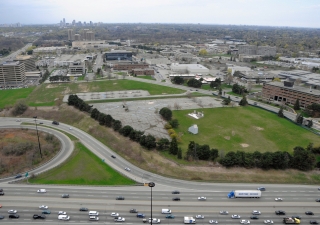 An aerial view of the Wynford Drive site, which is being developed into a park where the Ismaili Centre, Toronto and the Aga Khan Museum will be situated. The site is clearly visible from the adjacent Don Valley Parkway thoroughfare.