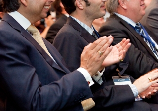 Prince Hussain and Ismaili Council President Mahmoud Eboo applaud during a presentation at the Governors’ Global Climate Summit 3 plenary session.