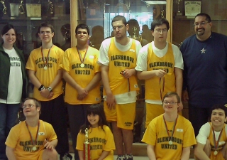 Arsheel (back row, third from left) with Coach Paal Joshi (back row far right) and his team after they won the regional gold medal at the District 225 Glenbrook United Special Olympics.