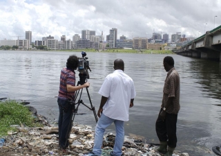 Preparing to capture the Abidjan skyline as part of a documentary feature.