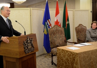 Mawlana Hazar Imam addresses the gathering at Government House, as Alberta Premier Alison Redford looks on.