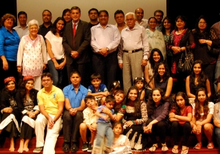 Members of the Jamat gather on stage for a photograph at the Asian Civilisations Museum in Singapore after their outreach event.